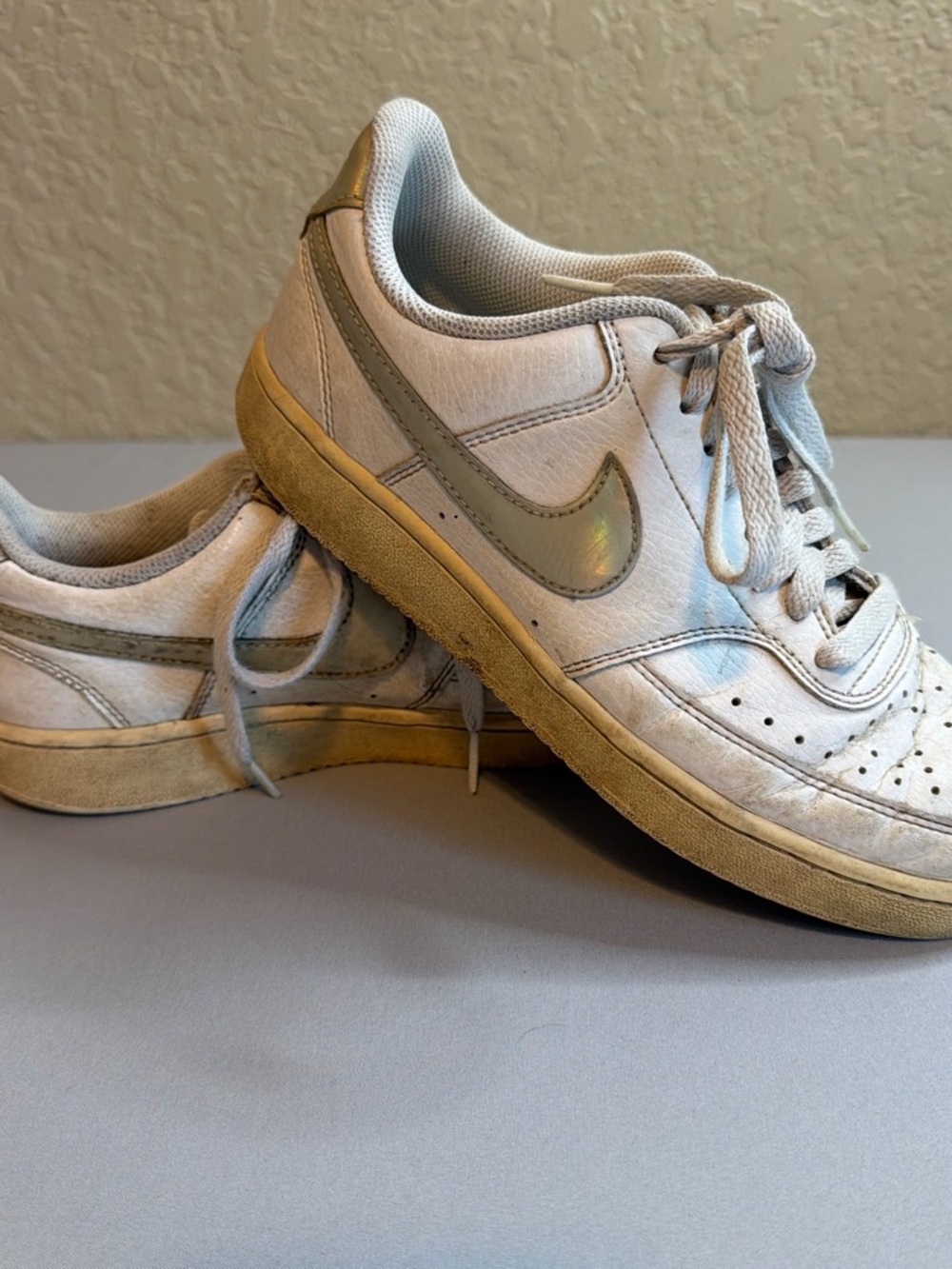 Nike White Low-Top Sneakers with Iridescent Swoosh